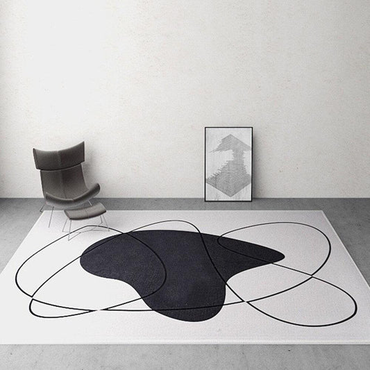 Tapis motif blanc et noir