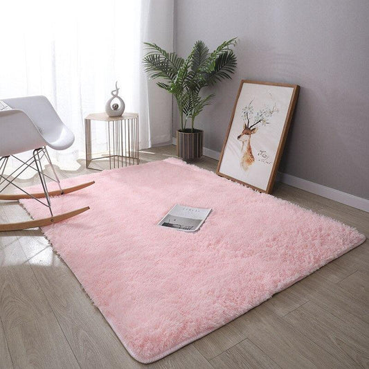 petit tapis rose poudre