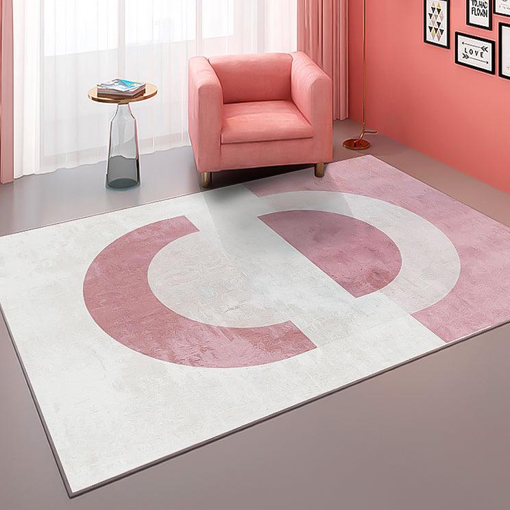 Tapis géométrique gris et rose